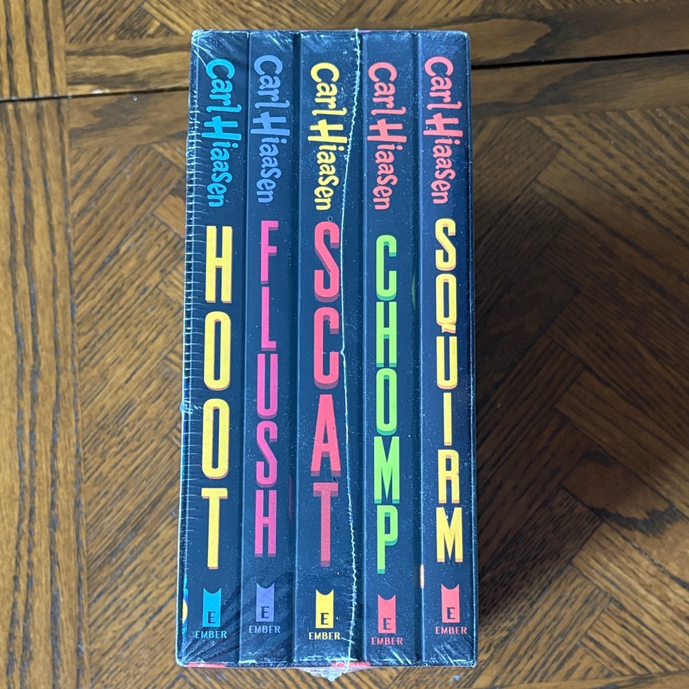Carl Hiaasen Book Set - Vibrant Collection, sealed, brand new set